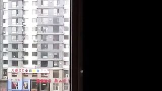 Asian Girl Shared at Open Window