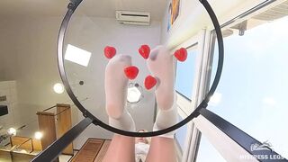 My Nylon Feet Squeezing Strawberry Juice on a Glass Table